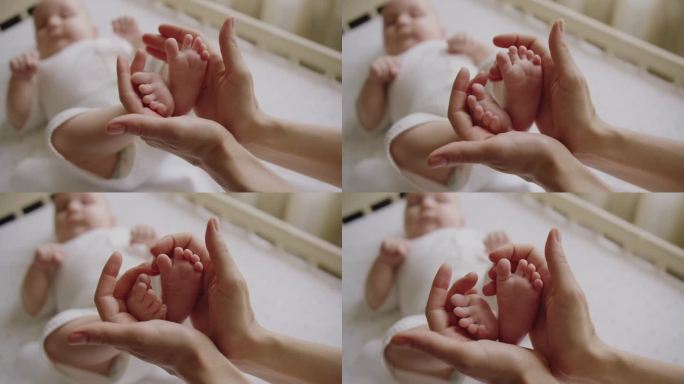 选择性地关注婴儿婴儿在母亲手中的小脚