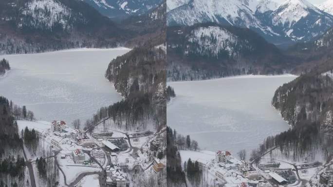 冬日里的阿尔卑斯湖。巴伐利亚阿尔卑斯山，德国。鸟瞰图。垂直视频
