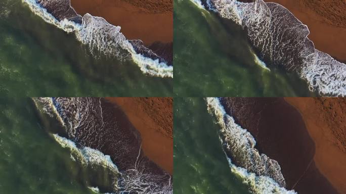 海滩海浪的镜头海浪拍打俯拍大海浪花涨潮退