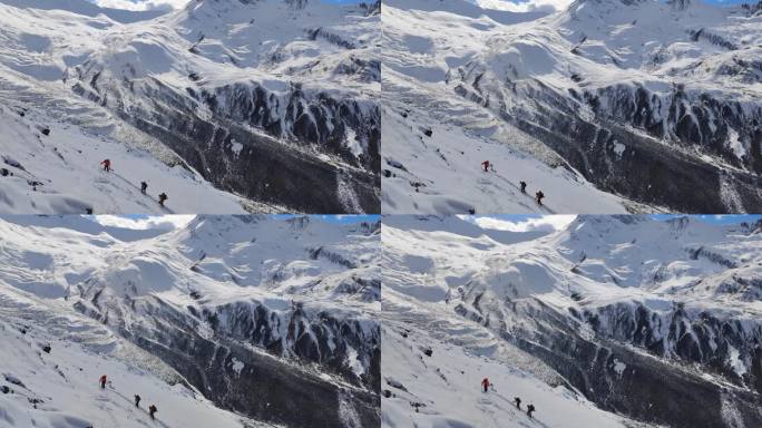 攀登乌库楚雪山的登山者大雪中徒步行进