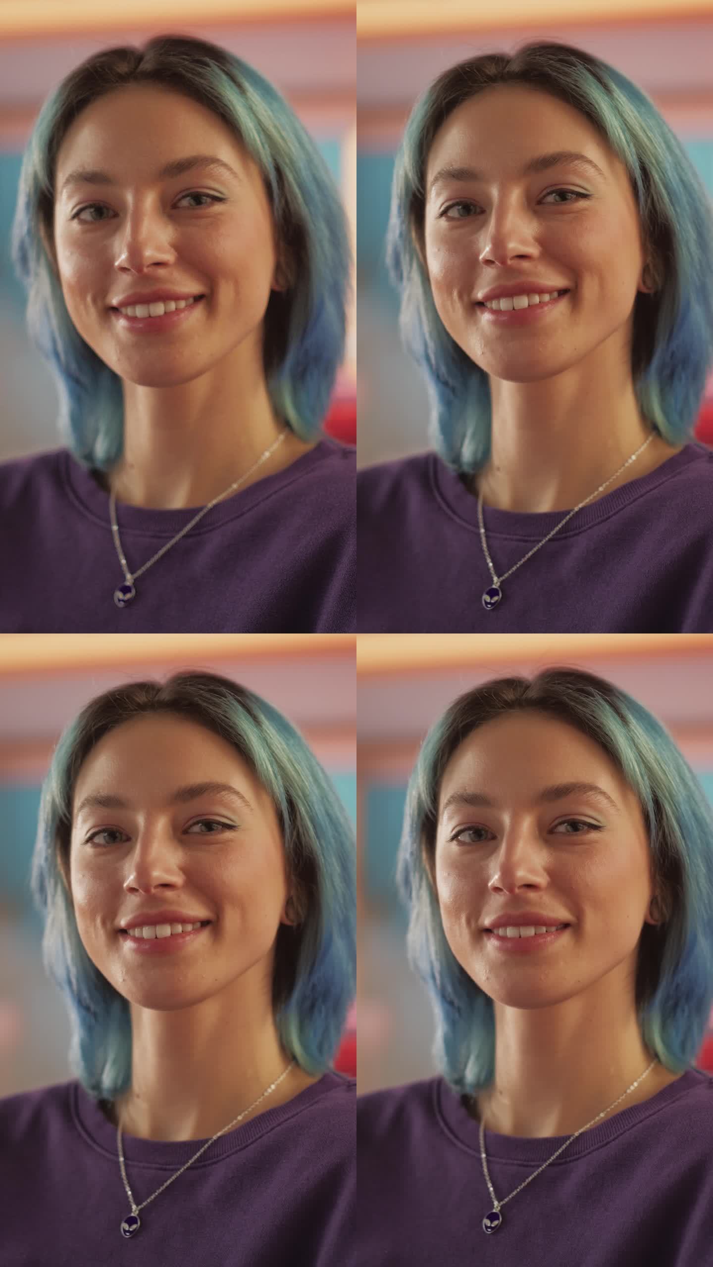 垂直屏幕:蓝色头发的美丽时尚女性的慢动作肖像，抬头看着镜头，迷人地微笑。成功的年轻女子在五颜六色的公
