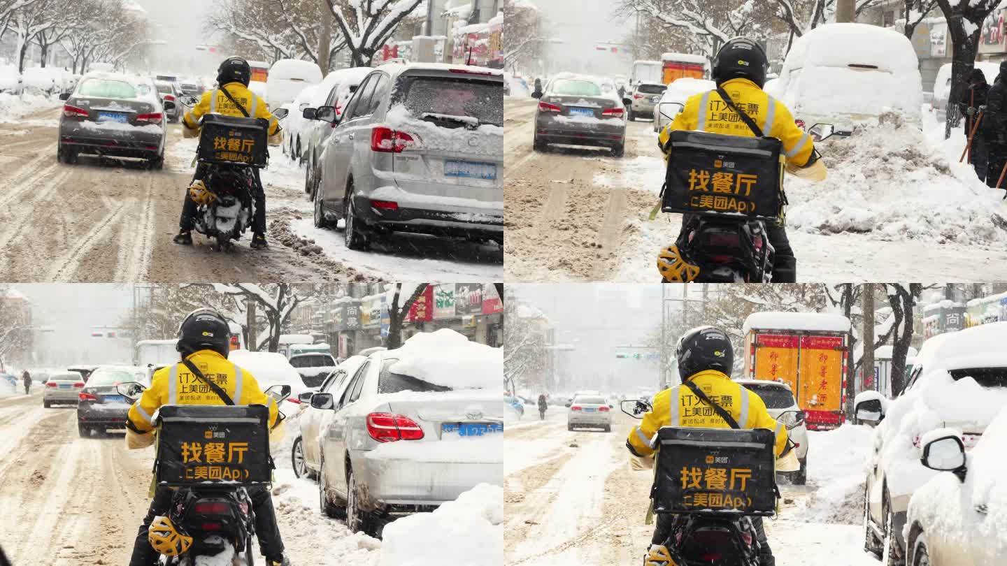 雨雪天外卖骑手取餐送餐在马路上骑行