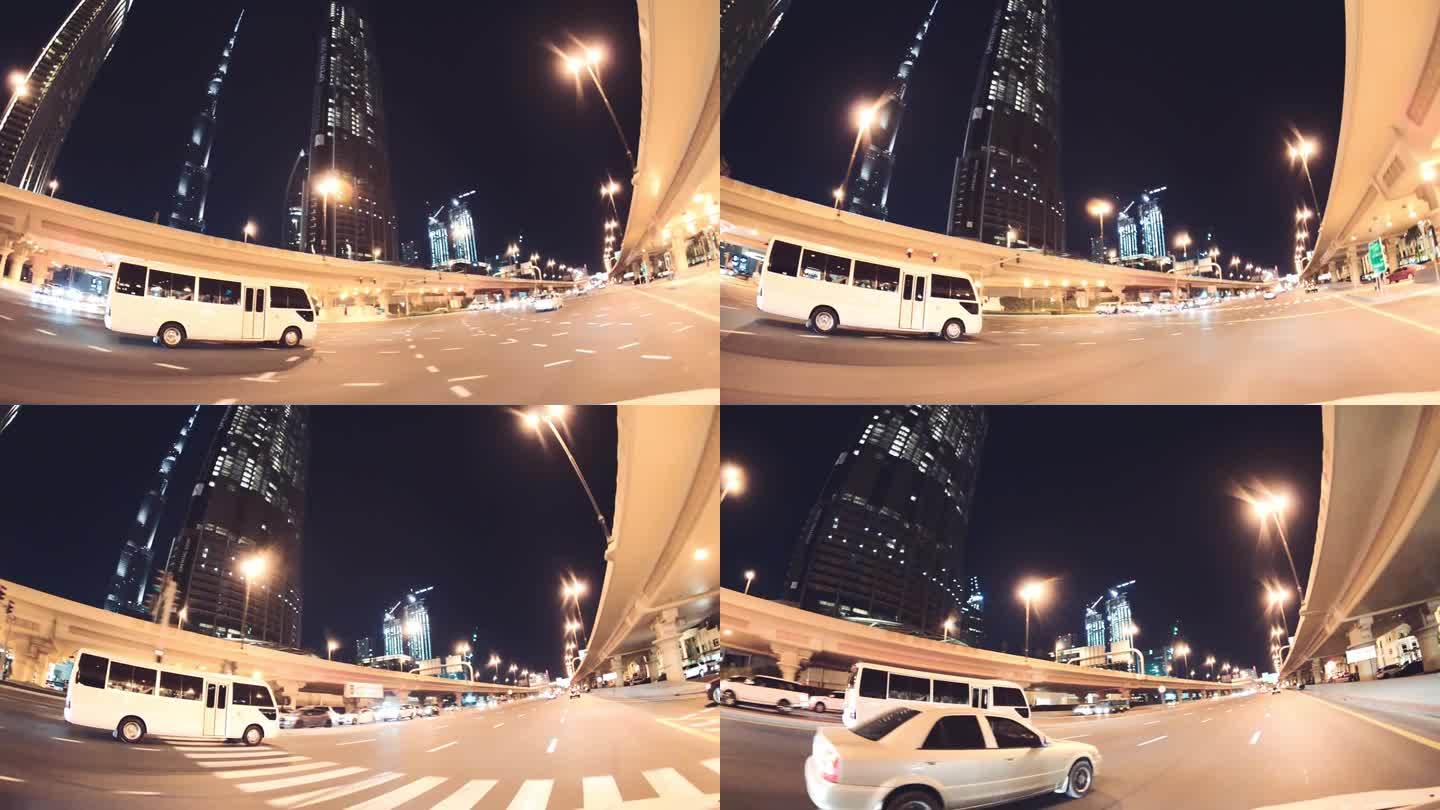2016年12月12日，阿联酋迪拜:夜晚通往迪拜市中心的道路，从汽车上俯瞰街景