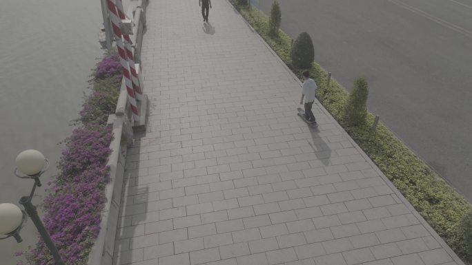 【4K】广州珠江边上少年在练习滑板