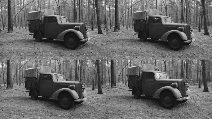 德国汽车卡车欧宝闪电战在森林。晴朗的秋日。军用卡车欧宝。德国国防军第二次世界大战军用汽车。秋天，大自