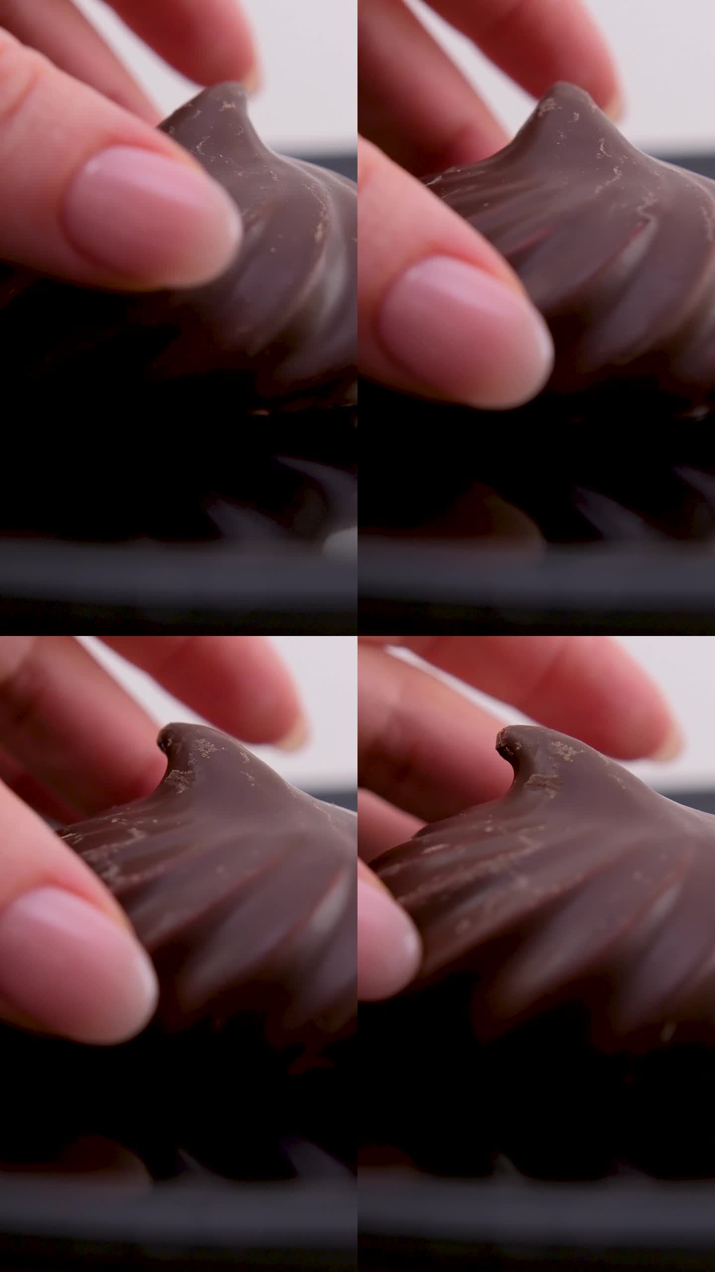 美味的甜点棉花糖在巧克力在一个黑色的盘子里女性手拿午餐自制手工美丽的餐厅服务反射特写广告糖果师课程生
