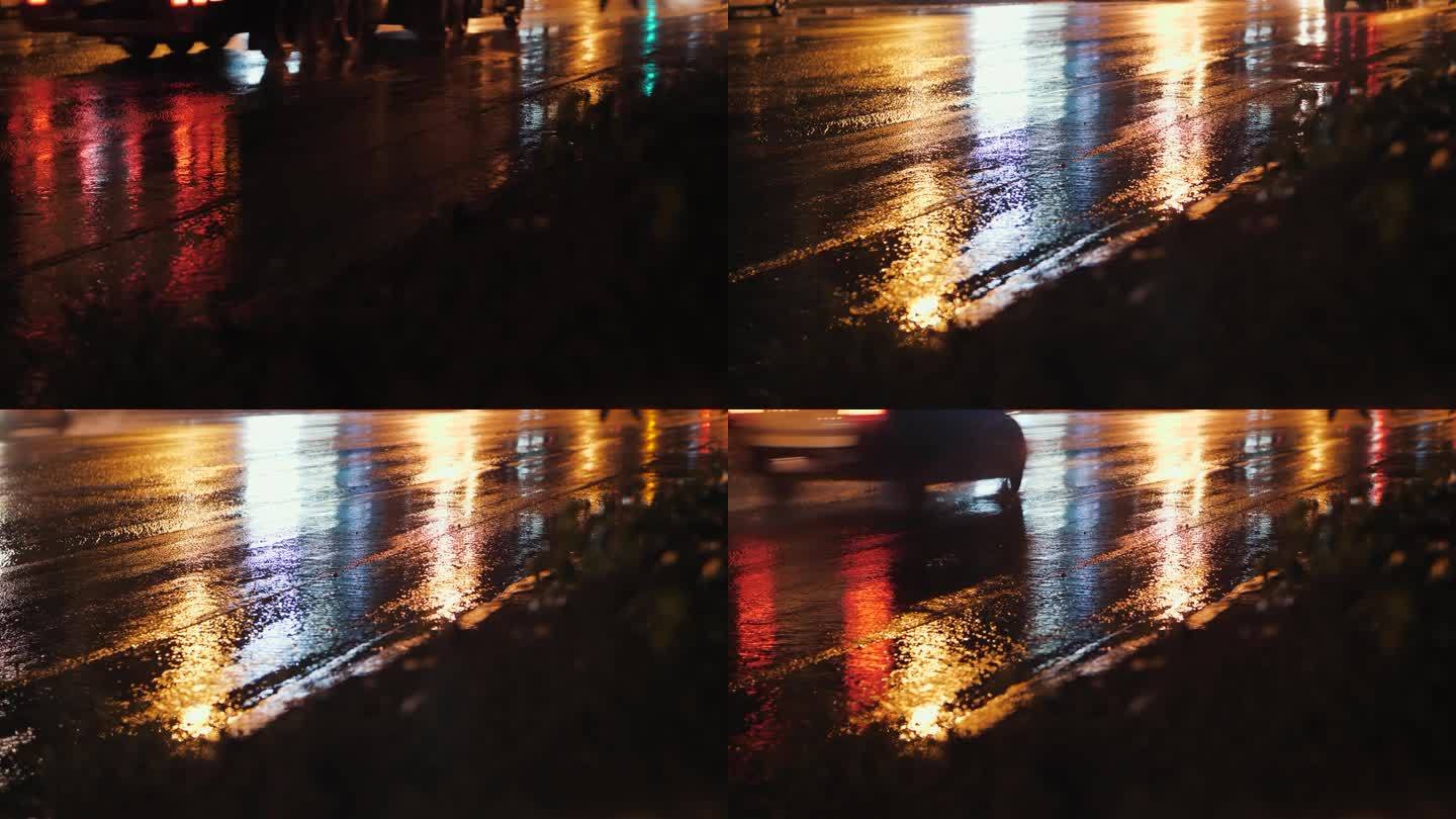 雨后的城市道路。汽车在柏油路上的倒影