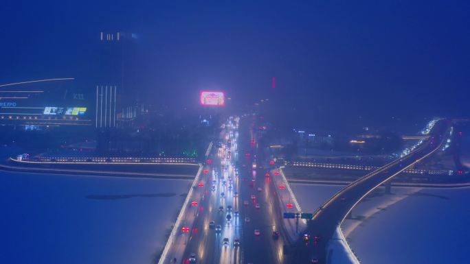 北方城市冬季下雪雪景夜景航拍