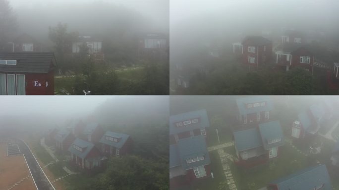 襄阳保康县横冲景区云雾缭绕中的民宿小木屋