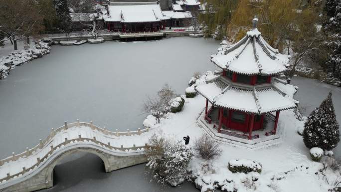 4K航拍古建筑雪景保定古莲花池雪景