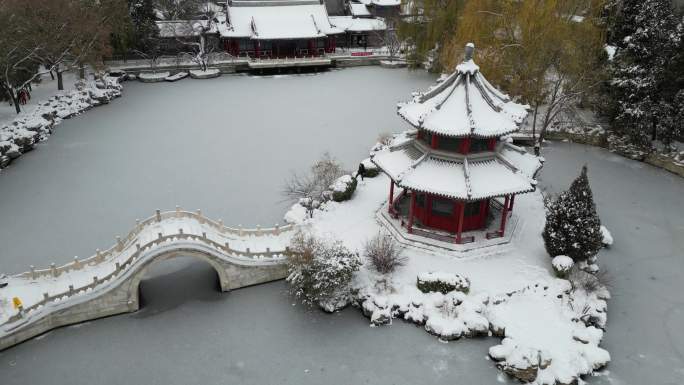 4K航拍古建筑雪景保定古莲花池雪景