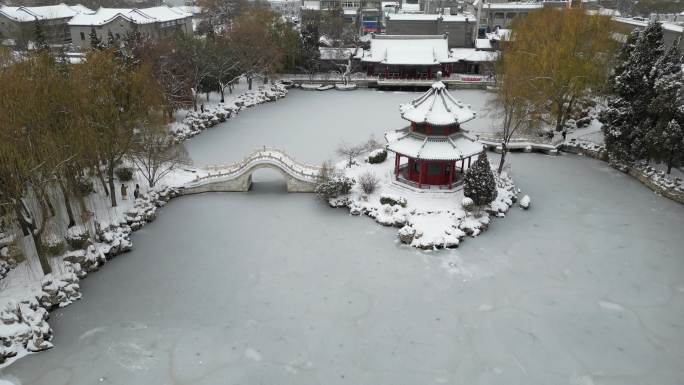 4K航拍古建筑雪景保定古莲花池雪景