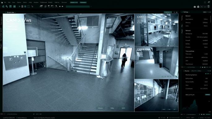 闭路电视监控录像，大楼内多屏显示，无法辨认的人在走动。高科技安全和数据保护模型。用于计算机显示器的屏