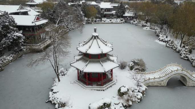 4k航拍古建筑雪景保定古莲花池雪景