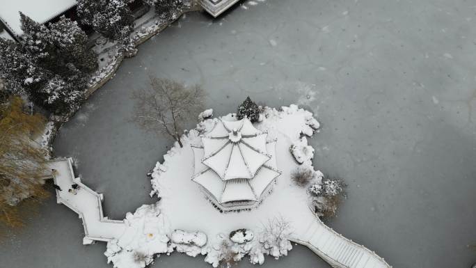 4k航拍古建筑雪景保定古莲花池雪景