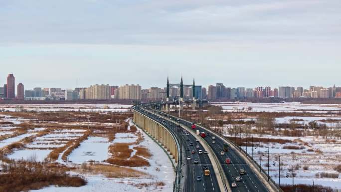 中国黑龙江哈尔滨阳明滩大桥雪景航拍合集