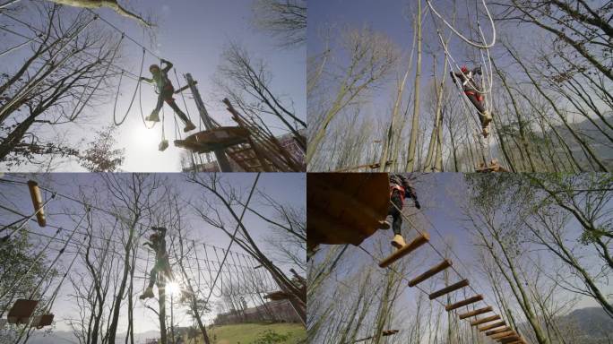 女子体验穿越丛林游乐项目爬网攀岩吊索单绳