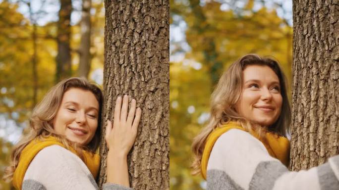 秋林中抱树抬头的微笑少女