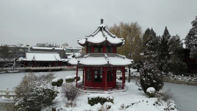 4K航拍古建筑雪景保定古莲花池雪景