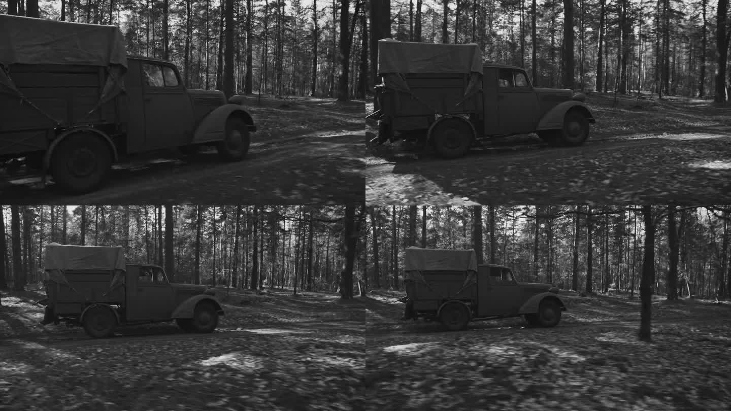 德国汽车卡车欧宝闪电战驾驶的森林道路。晴朗的秋日。军用卡车欧宝。德国国防军第二次世界大战军用汽车。秋
