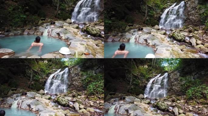 一名女子在瀑布旁的日式温泉浴中放松
