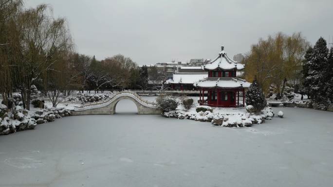 4K航拍古建筑雪景保定古莲花池雪景