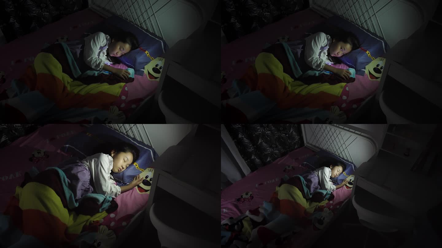 【4k】小女孩在床上玩手机