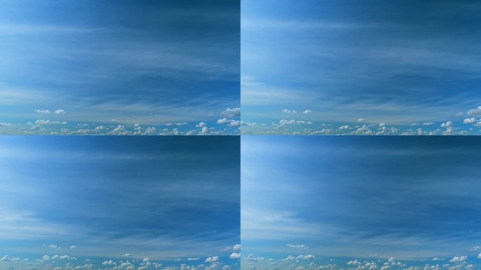 蓝天上飞舞的白云。蓝天背景与许多层小云。间隔拍摄。