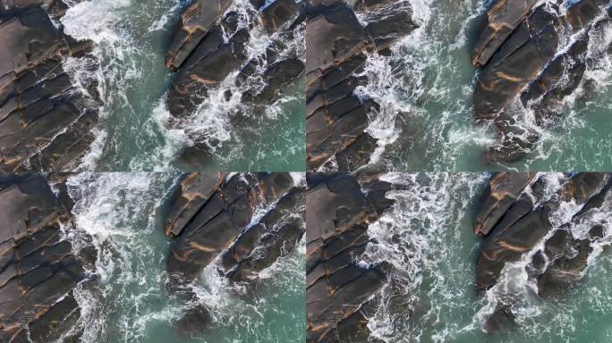 航拍泉州洛伽寺海边礁石海水升格慢门视频