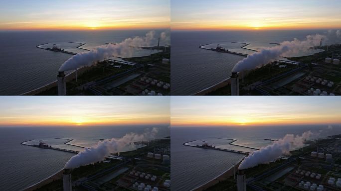 海南东方落日下的海边工厂
