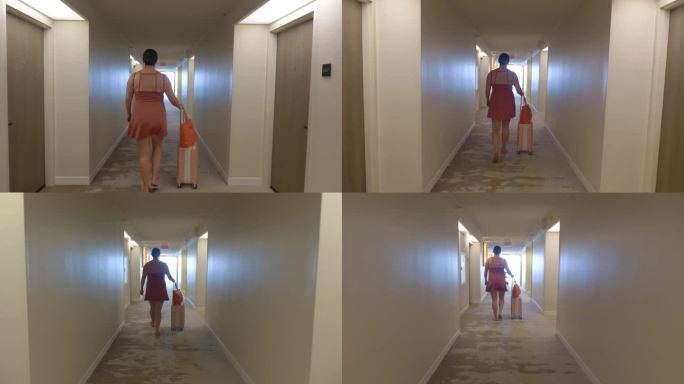 一个女人提着行李箱在酒店走廊里走，4k慢动作，60帧每秒