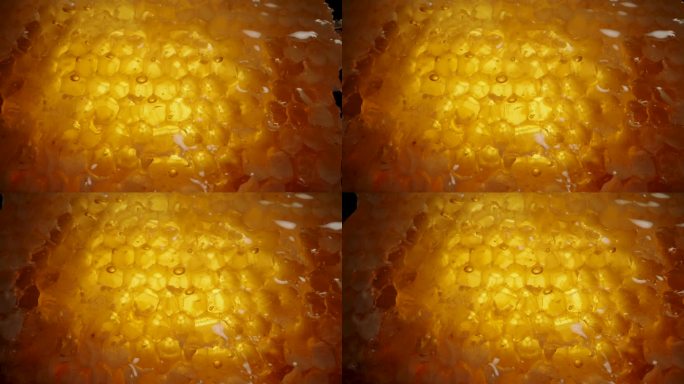 从宏观上看，蜂蜜滴下天然的金色蜂蜡梳。滑块为黑色。