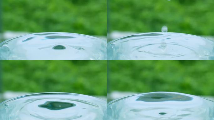 水滴落在装满水的杯子里，溢出来，也象征着生命的给予和富足。