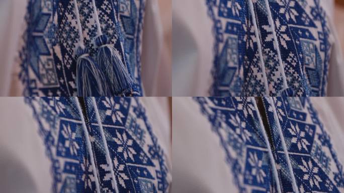 一件衬衫上的蓝色刺绣装饰，乌克兰民族服装的特写图，象征乌克兰。刺绣十字绣。乌克兰民族针法。传统的服装