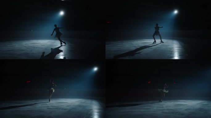 身材苗条的年轻女子花样滑冰运动员在冰上跳舞的剪影，慢镜头，花样滑冰