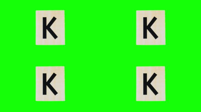 撕开的纸张上的小写字母k在对alpha通道的停止运动中拍摄