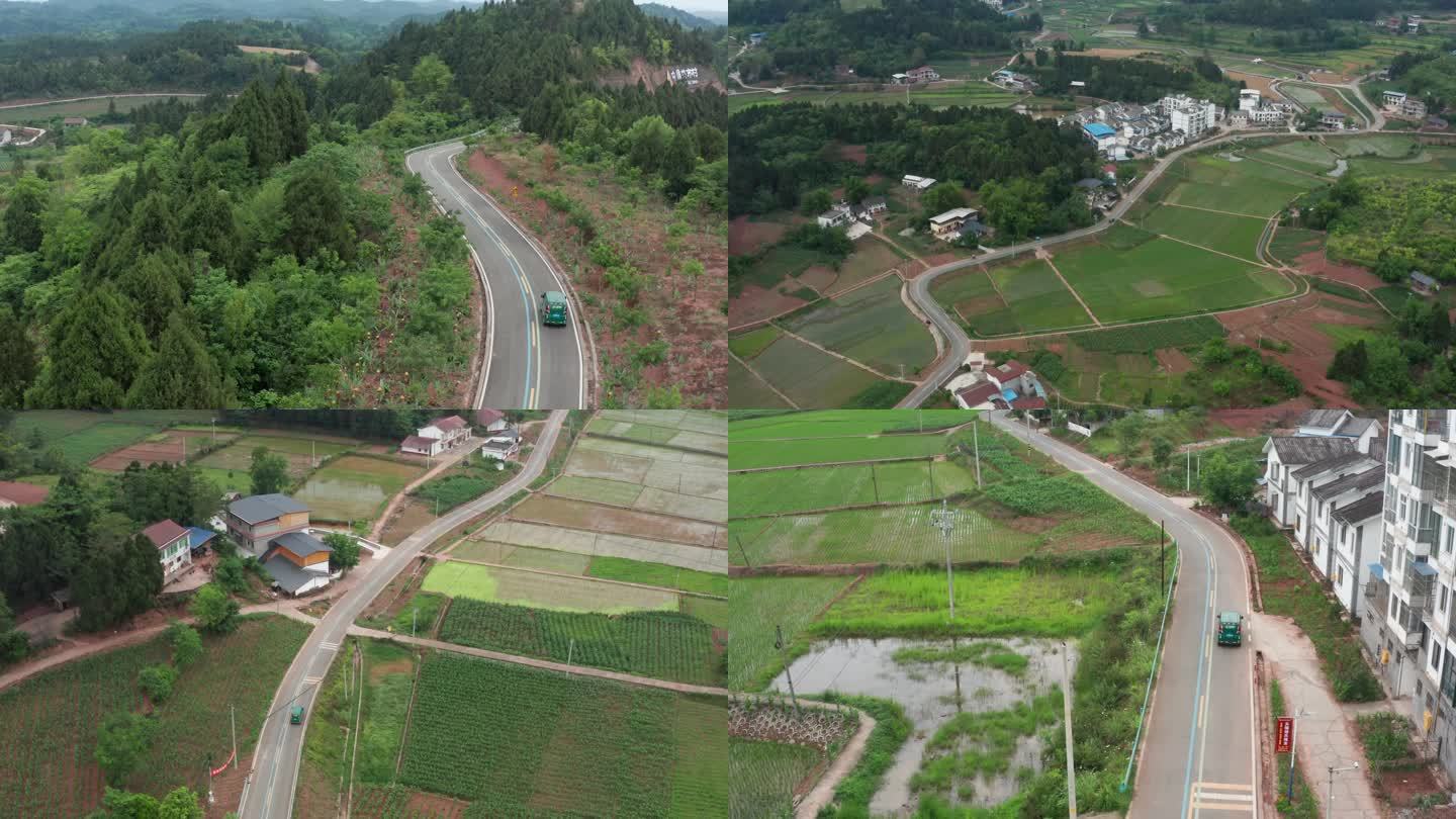 邮政快递车行驶在乡村道路 乡村电商