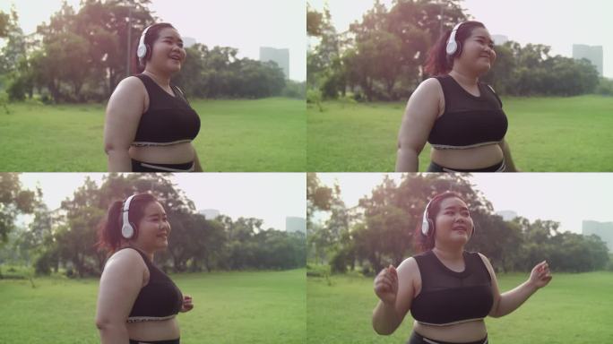 胖乎乎的女孩在公园里跳舞