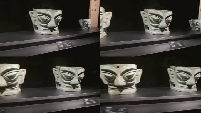 四川德阳广汉三星堆博物馆文物商青铜面具