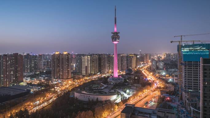4K西安地标陕西广播电视塔日转夜车流延时