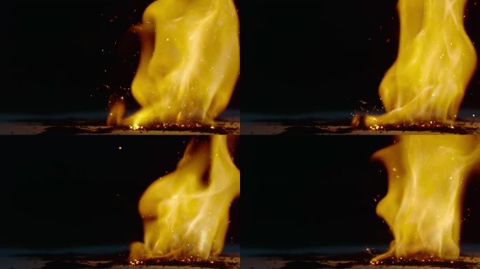 火花是从一堆燃烧的粉末中喷出的，这些粉末正在剧烈燃烧