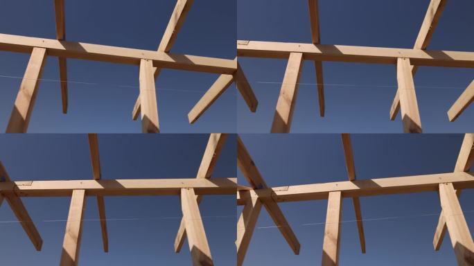 蓝天映衬下的木质建筑框架