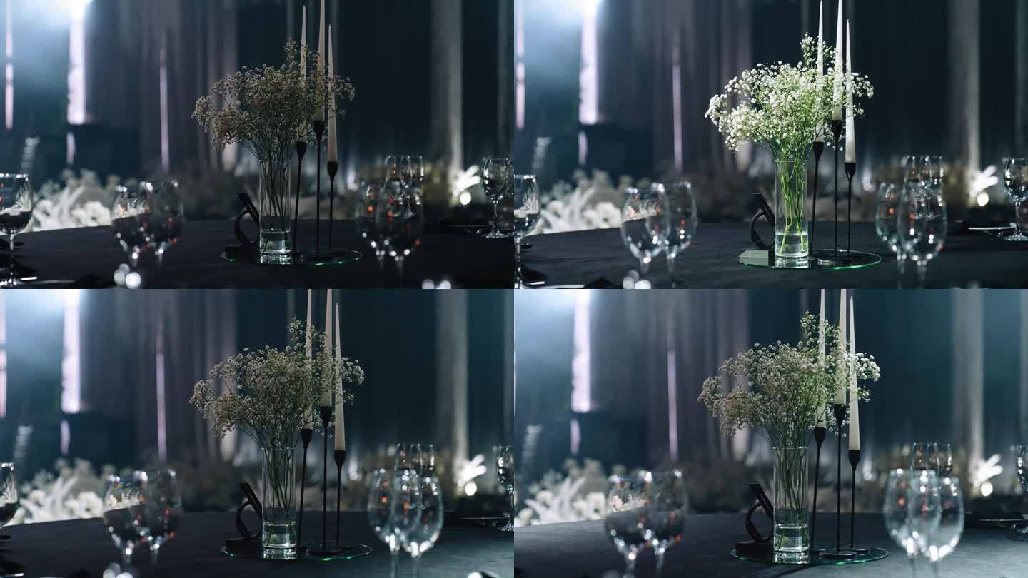 桌子上放着鲜花和蜡烛，等着客人来过节。拍摄动态特写