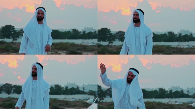 一位留着胡子的年轻商人身穿阿拉伯民族服装，在夕阳的背景下翩翩起舞。