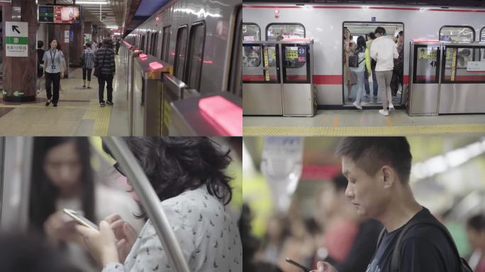 北京晚高峰地铁人群 地铁玩手机的人