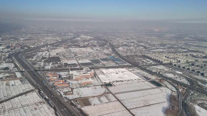 航拍太原晋源区晋祠公园稻田公园大雪雪景