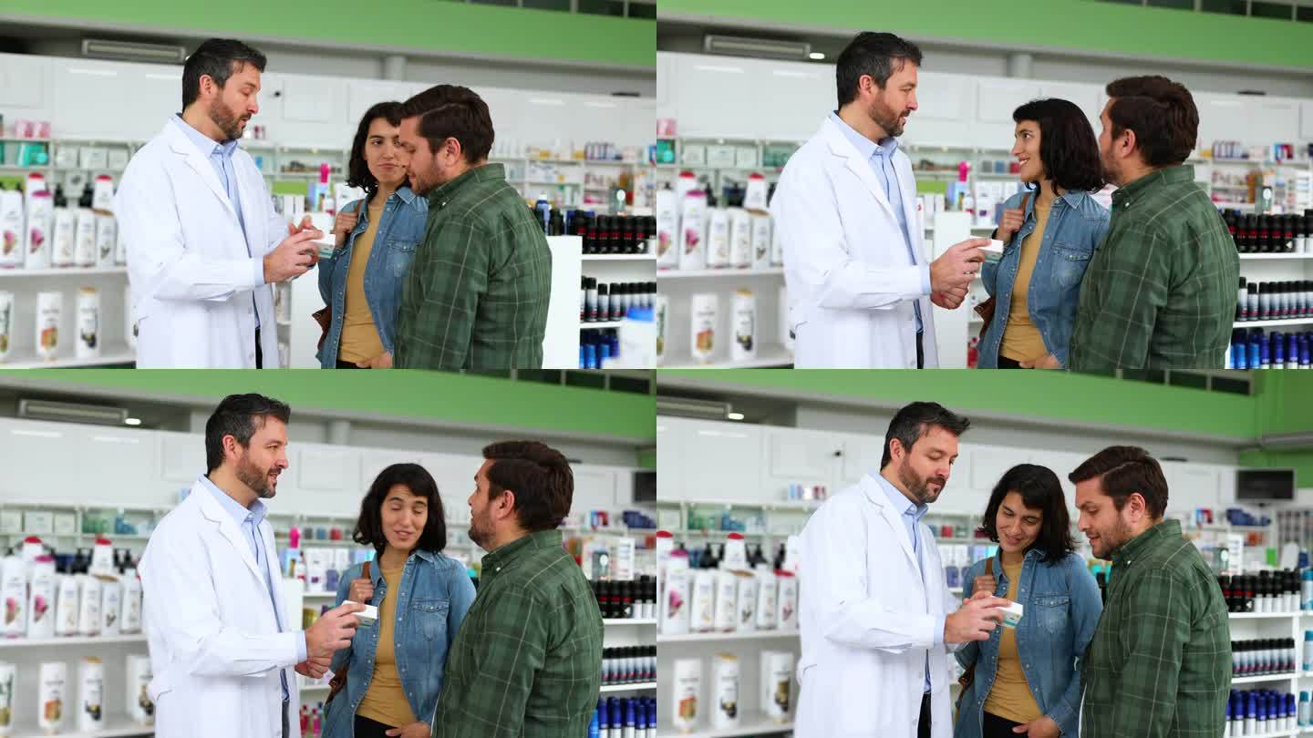 男药剂师在药店卖药给顾客夫妇