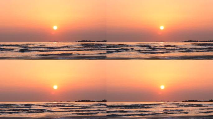 波光粼粼的海面与唯美的日出海浪与日出同框