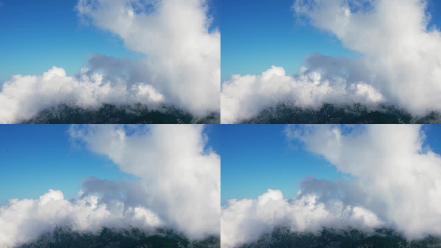 电影般的云团缓缓掠过山峰
