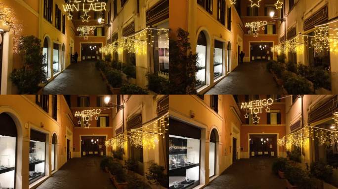 意大利罗马- 2023年6月12日:Margutta大街上的圣诞彩灯，上面有艺术家的名字。